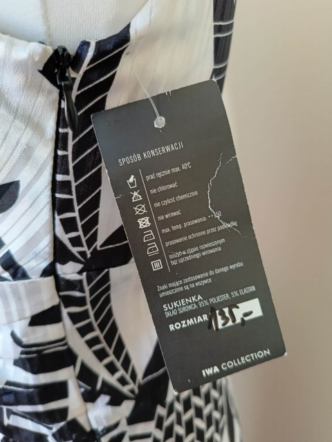 Sukienka damska Iwa Collection czarno biała midi r.42 kopertowy dekolt elegancka